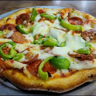 From the &quot;Create Your Own&quot; section of the pizza menu, I went with a &quot;Personal 6&quot; pizza, created by chef Gena, just the way I wanted it.