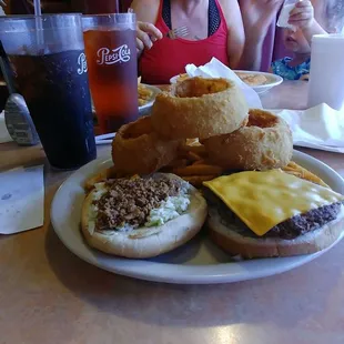 Forgot the name.. the burger with chili, onions and slaw (and mustard but I requested it without) and a side of onion rings and fries. Yummy