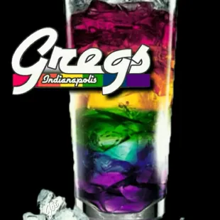 a tall glass filled with ice cubes