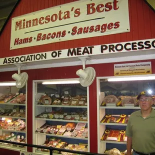 a man standing in front of a store