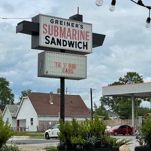 a sign for a sandwich shop