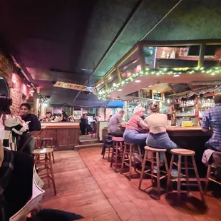 people sitting at the bar