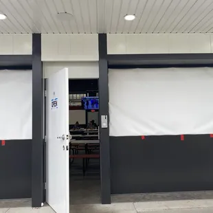 Door to interior seating, the building at the center of the carts