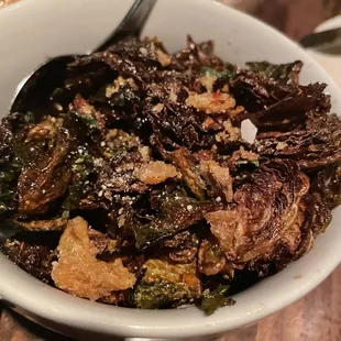 Fried brussel sprouts with fried chicken skin- amazing! Love that it&apos;s extra fried with the burnt ends