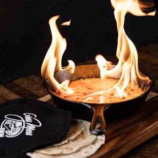 a skillet on fire