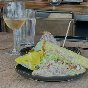 Turkey Bacon Dukes (1/2 sandwich) &amp; 1/2 Wedge salad in the background