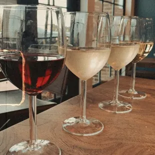 a row of wine glasses