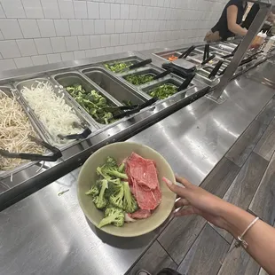 a plate of meat and vegetables