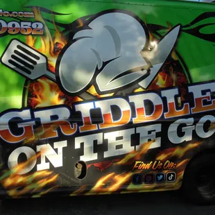 Graphics &amp; logo on the side of the truck.
