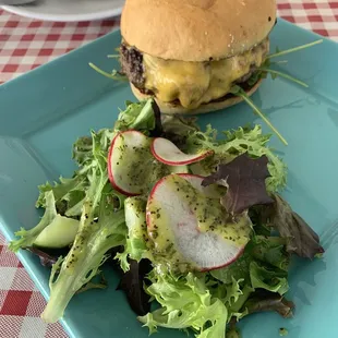 Yummy Bacon cheeseburger, side salad with homemade poppyseed dressing.