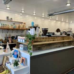 a woman working in a coffee shop