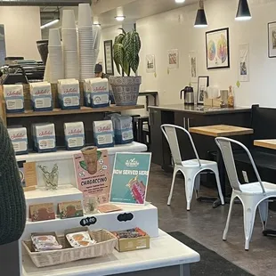 a coffee shop with tables and chairs