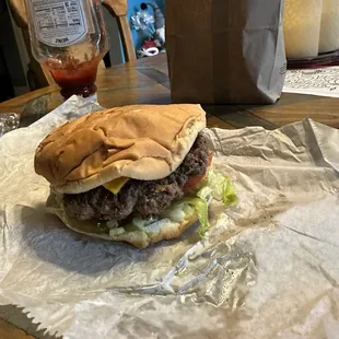 Bacon Cheeseburger fully dressed.