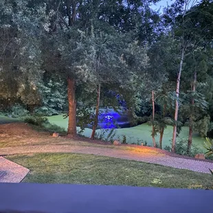 The fountain lights up at night. It's so beautiful.