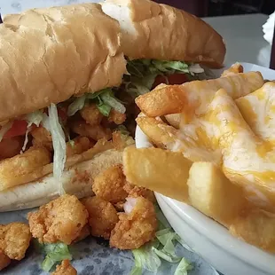 Shrimp po-boy and marsh fries!  Rich rown gravy at the bottom of melted cheese fries was an awesome surprise.