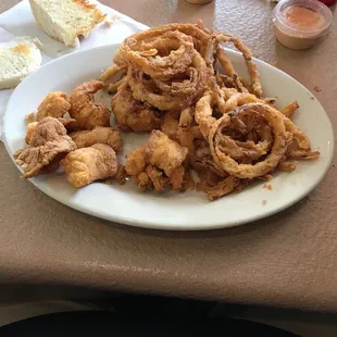 a plate of fried onion rings