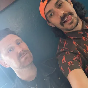 two men taking a selfie