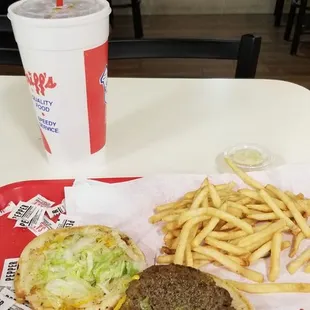 Giant double hamburger with mustard, cheese, extra onion and no tomato, hot fries and a large coke. Yum!