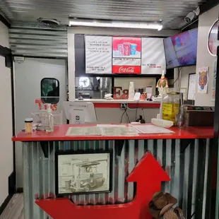 a view of a restaurant counter
