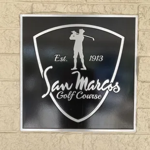 a sign for a golf course