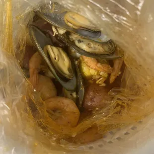 Combo A Seafood Combo House special. Lobster tail, crab legs, shrimp with side of green mussels