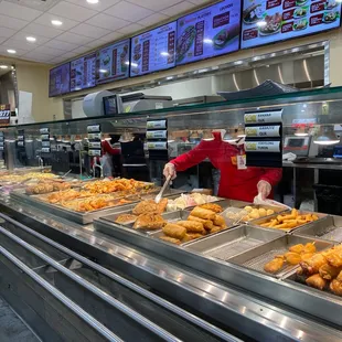 a man preparing food in a restaurant
