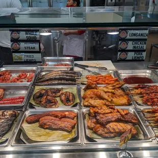 Grilled fish, pork and chicken