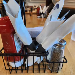 utensils in a wire basket