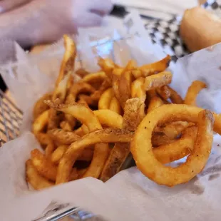 a basket of french fries and a hot dog