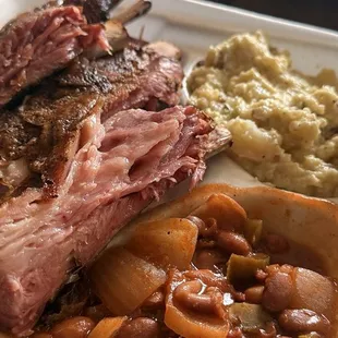 BBQ Pork Plate, sides, potato Salad, and Chili Beans