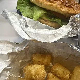 Vegan chicken sandwich and tater tots