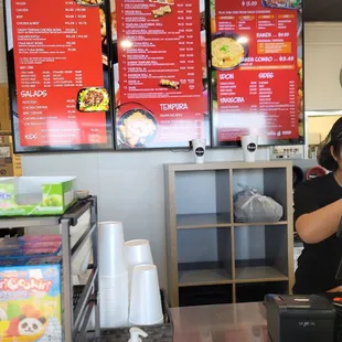 a woman behind the counter