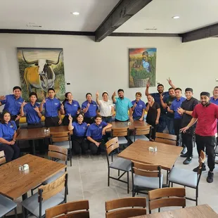 a group of people posing for a picture