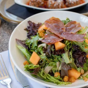 Mediterranean salad and crispy arancini