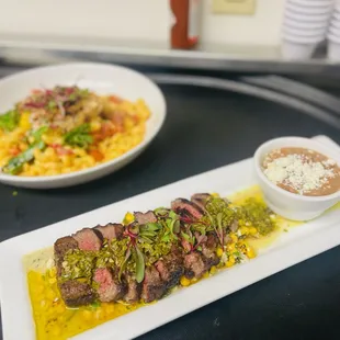 Smoked Churrasco Steak with Chimichurri, Mexican Street Corn Salad &amp; Charro Beans.