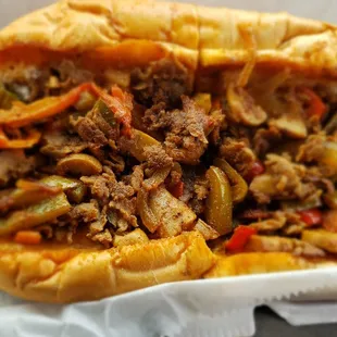 What&apos;s with the reddish hue in the Philly cheesesteak, doesn&apos;t even look like the business photo