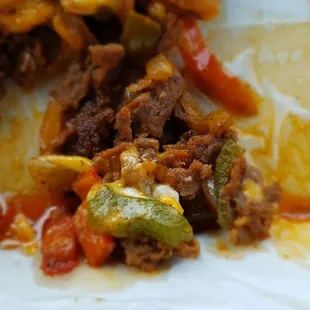 Very oily Philly cheesesteak and the meat just slides out of the sandwich