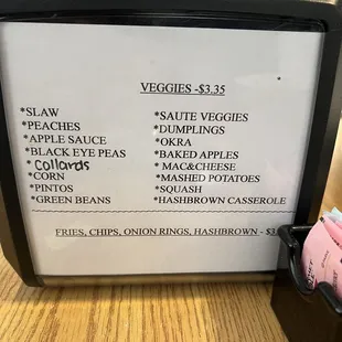 Veggies listed on the napkin dispenser