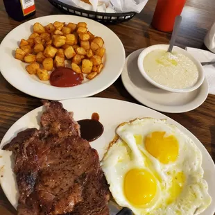 Steak and egg platter, with home fries, grits and choice of bread.  They give so much food!