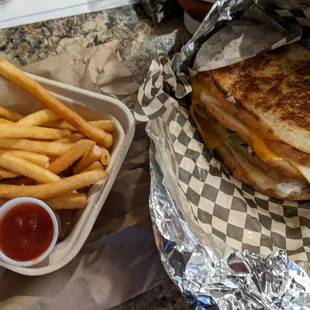 Grillo cheese burger and fries