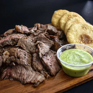 Picaña steak pound with sides (arepitas)