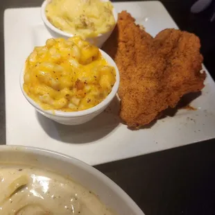 Catfish with mac &amp; cheese and garlic mashed potatoes.