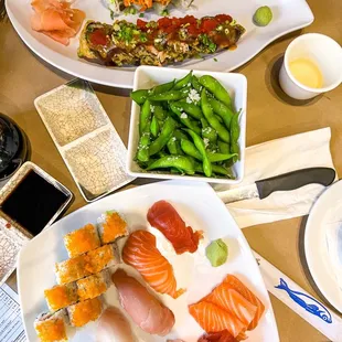 a variety of sushi on plates