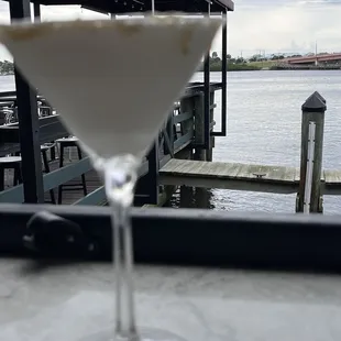 a martini glass on a table