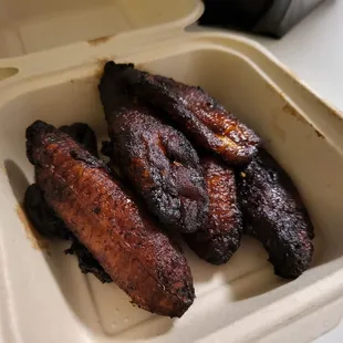 ribs in a styrofoam container