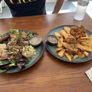 Shrimp and fries, chicken with brown rice and salad.
