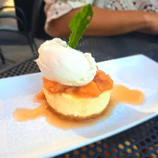 Amaretto Marscapone Cheesecake with white peach/ whiskey compote, and whipped cream. Damn that was Good!
