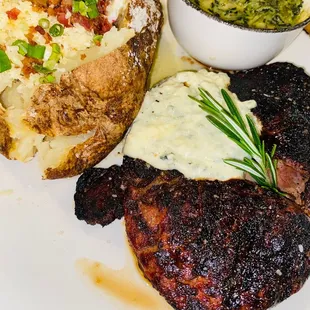 Another view .. Boneless Ribeye with blue cheese topping, loaded Baked Potato and creamed spinach