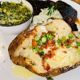 Loaded Baked Potato(this was a little over cooked but tasty), creamed spinach &amp; Boneless Ribeye