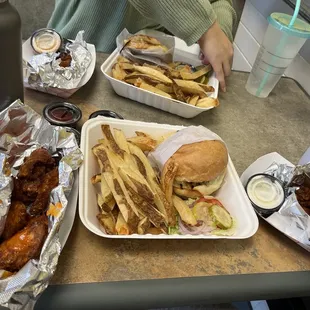 6 piece wings tossed in Buffalo  Grillshack Burger and fries